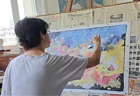 Vandana Krishna painting in studio